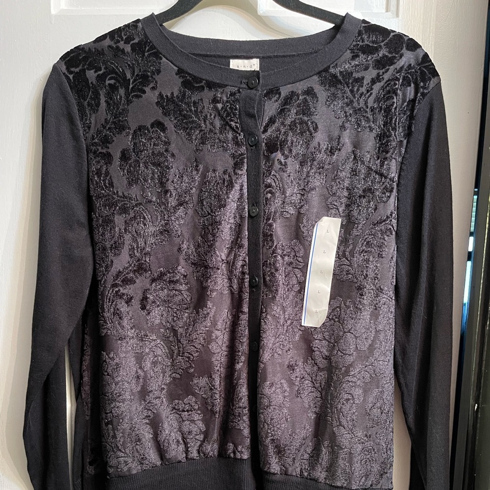 Black BRAND NEW NEVER WORN cardigan. Tag still on. Size L
